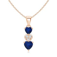 Two sapphire hearts are linked by a diamond studded heart motif. The sparkling diamonds beautifully enhance the mesmerizing blue sapphires. Suspended from a lustrous single bale, this sapphire heart pendant is crafted in 14k rose gold. Triple Heart, Blue Sapphire Pendant, Heart Motif, Sparkle Diamonds, Diamond Studs, 18k Rose Gold, Heart Pendant, Blue Sapphire, 18k Gold