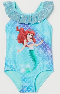 H&M Disney Little Mermaid Swimsuit. Size 2-4 Years. Color Teal Blue/Purple 81% Polyester 19% Elastane Lining 100% Polyester Get Ready For Under The Sea Fashion With This Adorable Little Mermaid Swimsuit With Glittery Ruffled Neckline & Straps. Brand New In Polybag. Disney H&M Swimsuit Bathing Summer Beach Blue Purple Little Mermaid Playful Mermaid Swimwear For Summer, Blue Character Print Swimwear For The Beach, Fitted Swimwear With Character Print For Swimming, Fitted Blue Swimwear With Character Print, Disney Swimwear For Beach In Summer, Disney Swimwear For Summer Beach, Cute Blue Bodysuit For Swimming, Cute Blue Swimming Bodysuit, Under The Sea Fashion