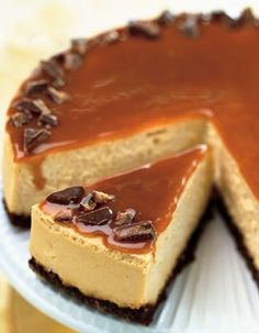 a cheesecake covered in chocolate and caramel