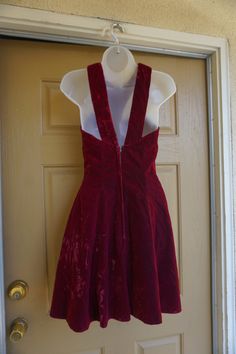 "LA Glo dress size 5/6. Please see measurements. Good condition. Measurements taken across front laid flat 16.5\" armpit to armpit 13.5\" across waist 22\" across hips 27\" length armpit to bottom" Velvet Fitted Dress For Red Carpet, Red Carpet Velvet Fitted Dress, Fitted Velvet A-line Dress, Fitted A-line Velvet Dress, Red Velvet Dress With Fitted Bodice, Red Sleeveless Velvet Evening Dress, Red Velvet Sleeveless Evening Dress, Red Velvet Dress For Holidays, Fitted Red Velvet Mini Dress