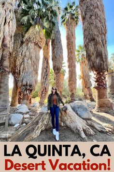 this post reads La Quinta CA Desert Vacation. Girl is standing in front of a palm tree farm in La Quinta California. Article links to the best things to do in La Quinta La Quinta California Things To Do, Palm Spring