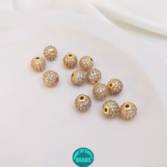 Kindly Note: this is real gold plated brass spacer beads,it is not that easy to get tarnished. ♨ Use:For Making Bracelet,necklace,usually use with the stone beads. See more Items: https://www.etsy.com/shop/Annieslittlethings ♨ Color: Gold ♨ Shipping: Dear,Customer,I usually ship the Item through E-pack (the updrade China Post) It will take 2-3 Weeks to US It will take 2-4 Weeks to other countries Gold Jewelry With Rhinestones And Round Beads, Gold Jewelry With Gemstone Beads, Gold Jewelry With Round Gemstone Beads, Gold Round Spacer Beads, Yellow Gold Round Beads For Jewelry Making, Handmade String Bracelets, Pumpkin Bead, Praying The Rosary, Pave Beads