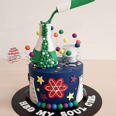 a birthday cake with an experiment on top