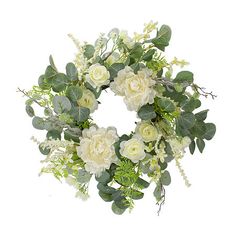 a wreath with white flowers and green leaves