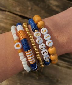 Team Spirit STACK Sports Bracelets School Bracelets - Etsy School Spirit Heishi Bracelets, Sports Clay Bead Bracelet, Danielle Celine, Team Spirit Ideas, School Spirit Crafts, Team Spirit Crafts, School Bracelets, Letter Bracelets