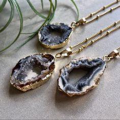 Purple-Grey Geode Rock Slice Pendant On A Golden Chain. A Beautiful 14k Gold Plated Brass Chain 20”. Delicate Lobster Claw Closure. Natural Geode So Each Pendant Itself From Their Company Is Different, But Size Is At Least About 1/2” By 3/4-1”. This Will Be In A Pretty Grey Organza Bag. Gorgeous For Gifting! Gorgeous For Yourself :) Handmade In Alabama By Estrella And Luna. Silver Boho Necklace, Luna Jewelry, Gold Feather Necklace, Crystal Protection, Boho Pendant Necklace, Geode Jewelry, Cowrie Shell Necklace, Dremel Tool, Geode Slice