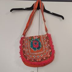 Brand New With Tags. Smoke And Pet Free Home. Summer Bags With Multicolor Embroidery For Daily Use, Multicolor Embroidered Bags For Daily Summer Use, Embroidered Shoulder Bag For Summer Festivals, Bohemian Floral Embroidery Shoulder Bag For Spring, Bohemian Orange Bags For Spring, Traditional Embroidered Bags For Spring, Casual Bags With Multicolor Embroidery For Summer, Bohemian Shoulder Bag With Multicolor Embroidery For Spring, Orange Bohemian Bags For Spring