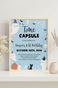 a blue halloween party poster on a shelf next to a vase and potted plant