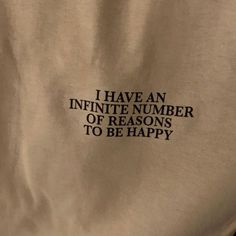 the back of a t - shirt that says i have an infinite number of reasons to be happy