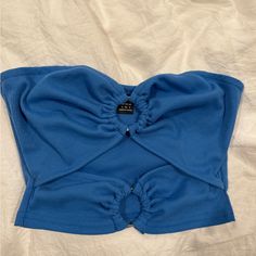 Size Small. Never Worn. Blue Tube Top For Day Out In Spring, Blue Tube Top For Spring Day Out, Chic Blue Tube Top For Spring, Trendy Blue Tube Top For Spring, Blue Sleeveless Tube Top For Day Out, Sleeveless Blue Tube Top For Day Out, Blue Tube Top For Day Out, Trendy Blue Tube Top For Day Out, Casual Blue Crop Top Tube Top