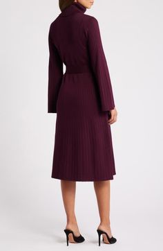 "Find JULIA JORDAN Turtleneck Long Sleeve Rib Midi Sweater Dress on Editorialist. Wide ribbing adds soft texture to this elegant sweater-dress knit with a foldover turtleneck and tethered at the waist by a matching sash. 44\" length Turtleneck Long sleeves Removable sash Unlined 78% rayon, 22% polyester Machine wash, dry flat Imported" Turtleneck Sweater Midi Dress, Fitted Ribbed Turtleneck Midi Dress, Brown Ribbed Midi Sweater Dress, Winter Knitted Midi-length Sweater Dress, Elegant Ribbed Midi-length Sweater Dress, Midi Sweater Dress, Dress Knit, Elegant Sweater, Turtleneck Long Sleeve