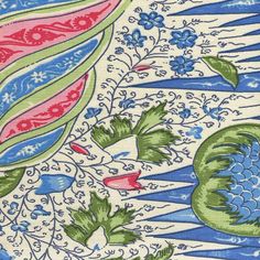 an artisticly designed fabric with blue, green and red designs on it's surface