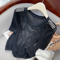 SIZE CHARTOne Size: length: 47cm, Bust: 88cm, shoulder: 35cm, sleeve: 21cm.Note:(1 inch = 2.54 cm, 1 cm = 0.39 inch) Black Pointelle Knit V-neck Top, Knitted Short Sleeve Tops For Fall, Knitted Short Sleeve Tops For Summer, Knitted Short Sleeve Summer Tops, Open Knit Short Sleeve Top, Casual Crochet Short Sleeve Top, Casual Short Sleeve Crochet Knit Top, Fall Pointelle Knit Short Sleeve Tops, Fall Short Sleeve Pointelle Knit Tops