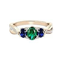 three stone ring with blue and green stones