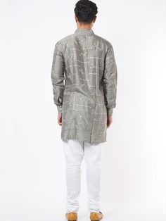 This grey silk kurta will instantly give an elegant look.  Made from blended silk fabric, this grey kurta has front buttons fastening, a mandarin collar and mirror embroidery work all over. It is paired with a white churidar pants. An ideal outfit for traditional & special events.

Size Chart For Men





	
	
					Men's Size Chart
		

		
		
						
				Size Chart For Men
				Custom Size Measurement Guide
			
			
				
				
				Custom Size Measurement Guide
1. Take your measurements at ease…don’t h Designer Straight Kurta With Mirror Work, Designer Straight Kurta For Festivals, Unstitched Silver Kurta With Resham Embroidery, Designer Silver Kurta With Zari Work, Silver Bollywood Kurta With Mirror Work, Silver Kurta With Mirror Work For Diwali, Festive Silver Kurta With Resham Embroidery, Bollywood Style Silver Kurta For Diwali, Silver Bollywood Kurta For Diwali