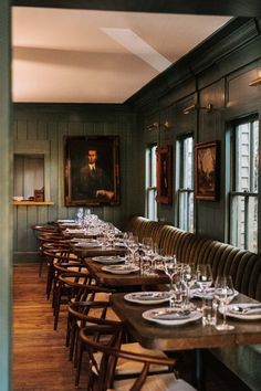 a long table set with empty wine glasses