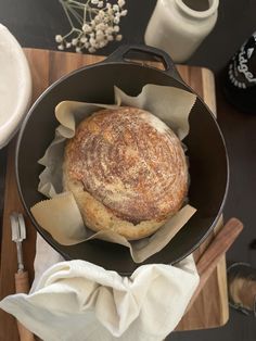 a pan with some bread in it on a table