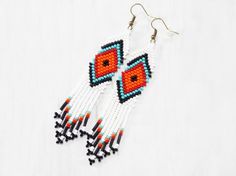 Ojo de Dios earrings Mexican jewelry Square tribal fashion earrings White huichol earrings Authentic White Southwestern Beaded Earrings For Festivals, Southwestern White Beaded Earrings For Festival, White Southwestern Style Beaded Earrings For Festival, White Handwoven Earrings For Summer, Traditional White Earrings For Summer, Traditional Multicolor Summer Jewelry, Traditional Orange Jewelry For Summer, Traditional Orange Summer Jewelry, Southwestern Style Earrings With Colorful Beads