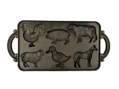 a metal tray with farm animals and birds on it's sides, set against a white background