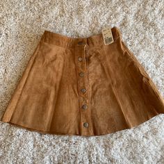 Size Small. Never Worn, No Flaws. With Tags! Super Cute Bought At Forever 21 Trendy Brown Skirt For Spring, Trendy Brown Mini Skirt With Button Closure, Trendy Brown Mini Skirt For Day Out, Trendy Brown Skirt With Button Closure, Trendy Brown Skirt For Day Out, Brown Mini Skirt For Fall Day Out, Chic Forever 21 Mini Skirt For Fall, Casual Forever 21 Skirt For Fall, Forever 21 Brown Bottoms For Fall