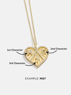 ​Start your own tradition with the Heart 18K Gold Custom Medallion Necklace. Available in two different sizes, this heart-shaped pendant features a beautiful border of sparkly Cubic Zirconia stones. Add three special numbers, letters, or a mix of both (single digit numbers only) - the options are endless. Better yet, this piece is crafted with 18K gold plated sterling silver, meaning it'll last you a lifetime. Gold Diamond Accented Heart-shaped Necklace, Gold Heart Diamond Necklace With Accents, Gold Heart-shaped Diamond Necklace With Accents, Heart-shaped Diamond Necklace In Gold, Gold Diamond Necklace With Accents For Valentine's Day, Luxury Gold Diamond Necklace For Valentine's Day, Gold Cubic Zirconia Heart Pendant Diamond Necklace, Gold Cubic Zirconia Diamond Necklace With Heart Pendant, Gold Diamond Cut Heart Pendant Necklace