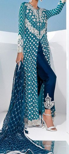 Product Description:  Teal Outfit with embellishment Color: Cobalt Blue Includes:  Tunic - Georgette Chiffon Pant - Viscose Silk Duppata - Chiffon Elegant Traditional Drape Pants For Eid, Elegant Designer Pants With Traditional Drape, Elegant Festive Designer Bottoms, Elegant Silk Pants With Zari Work, Elegant Silk Bottoms For Festive Season, Unstitched Bottoms With Zari Work For Wedding, Elegant Pants With Traditional Drape For Parties, Elegant Party Pants With Traditional Drape, Elegant Bottoms With Dupatta For Eid