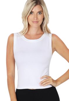 The new cropped seamless round neck tank top is so versatile. Wear it to work out, wear it with your summer outfits or use it as a layering piece with jackets & cardigans. We know you will love this piece! 68% Nylon 25% Polyester 7% Spandex 0-8 S/M 10-14 L/XL New Top, White Crop Top, Sleeveless Tank, Layering Pieces, Crop Tank, Work Out, Basic Tank Top, Round Neckline, To Work