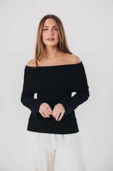 You'll love wearing this lightweight sweater year-round! The Palmer Sweater features a stunning off-the-shoulder neckline, and is crafted from a fine ribbed knit. It's stunning paired with trousers, denim, or a silky midi skirt; it's a versatile addition to any fashionista's wardrobe. Available in two colorways. FIT: Runs true to size - fitted. MATERIAL: 65% Viscose, 35% Nylon. GARMENT DETAILS: Fine-ribbed sweater top featuring a fold-over, off-the-shoulder neckline and flared long sleeves. SIZE Stretch Long Sleeve Off-shoulder Top For Fall, Stretch Off-shoulder Long Sleeve Top For Fall, Trendy Off-shoulder Ribbed Sweater, Trendy Stretch Off-shoulder Top For Fall, Versatile Long Sleeve Off-shoulder Top For Fall, Stretch Off-shoulder Knit Top For Fall, Stretch Off-shoulder Top For Winter, Black Off-shoulder Sweater For Spring, Ribbed Stretch Off-shoulder Sweater