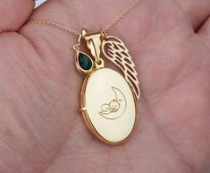 "Custom engraved locket with photo,memorial oval locket with angel wing,anniversary gift,remembrance photo locket,Valentine's day gift,anniversary gift To send your locket photo(s), please send me a conversation with your photos attached Carrying the pictures of your loved ones close to your heart all the time, this personalized locket necklace features: 1. an oval solid sterling silver or 24K yellow/rose gold plated over sterling silver locket (26 x 19 mm, 4.6 grams) that can hold two pictures. Personalized Pendant Locket Necklace For Memorials, Keepsake Birthstone Locket Necklace, Personalized Oval Pendant Locket Necklace For Memorials, Birthstone Locket Necklace Keepsake, Round Birthstone Locket Necklace Keepsake, Oval Locket Jewelry For Commemoration, Keepsake Birthstone Locket Pendant Necklace, Keepsake Birthstone Pendant Locket Necklace, Personalized Oval Locket Necklace For Memorial