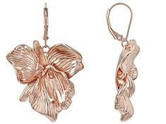 Timna Jewelry Collection™ Floral Copper Dangle Earrings. Measures approximately 1.67"L x 1.07"W. Lever backings. Spring Formal Rose Gold Jewelry, Rose Gold Drop Earrings For Spring, Spring Rose Gold Dangle Jewelry, Rose Gold Metal Earrings For Spring, Elegant Nickel-free Hoop Earrings For Spring, Spring Rose Gold Drop Earrings, Elegant Nickel-free Spring Jewelry, Adjustable Copper Flower Earrings, Bohemian Brown Dangle Flower Earrings