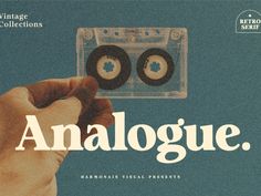 a hand holding an audio cassette with the words analogue on it