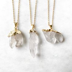 "Beautiful, real quartz crystal chunks turned in to pendants. These are extra quality druzy geode pieces, with gorgeous, gemmy, well formed crystals. They are not too heavy and are easy to wear. They have been gold plated and they are strung on a gold plated chain. You will receive the exact pendant of your choice. The chain length is customizable from 16\"-36\". Each pendant is approximately 1.5 - 2 inches long, but because each is a unique, natural product there is some variation. Jewelry from Raw Quartz Stone Pendant Necklace, Quartz Raw Stone Healing Necklaces, Quartz Healing Necklace With Raw Stone, Healing Quartz Necklace With Raw Stone, Quartz Crystal Necklaces With Gemstone For Gift, Quartz Crystal Necklace With Gemstones For Gifts, Quartz Pendant Necklaces With Raw Stone, Quartz Raw Stone Pendant Necklace, Quartz Crystal Necklace With Raw Stone For Healing