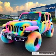 a colorful jeep parked in a parking lot