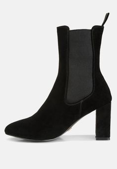 Discover the epitome of chic with these high ankle suede Chelsea boots! Their comfortable cushioned insoles make them an effortless pair to wear and style. Their versatility allows maximum wearability and makes them a staple in every shoe wardrobe. Type: Boots Upper Material: Suede Light Cushion Insole Outer Sole: TPR Block Heels Closed Almond Toe Elasticated Gussets Pull Tabs High Ankle Boots RCSH4340 Winter Black Chelsea Boots With Suede Lining, Black Fall Boots With Suede Lining, Suede Boots With Padded Ankle And Round Toe, Black Boots With Suede Lining For Fall, High Ankle Suede Chelsea Boots For Fall, Suede High-top Boots For Work, High-top Suede Boots For Work, Chic Suede Chelsea Boots For Winter, Chic Winter Suede Chelsea Boots