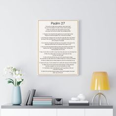 an image of a book page on a wall above a table with flowers and books