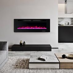 a modern living room with an electric fireplace