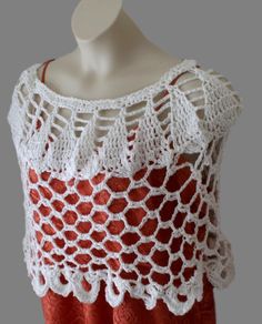 This beautiful womens white crochet poncho will look great with an elegant dress or jeans and a sweater. Makes a great gift for any woman or teen. It measures 14" long and about 17" around the neck.    Made out of 100% acrylic yarn. Let me know if you would like it in different colors.  Thanks for visiting. Made to order Made in a smoke free home Back to my shop www.etsy.com/shop/lanacooper Wedding Capelet, White Poncho, Poncho Au Crochet, White Shawl, Ladies Poncho, Crochet Poncho, White Crochet, Elegant Dress, Acrylic Yarn