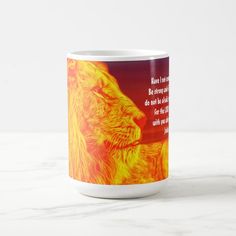 a mug with an image of a lion on the front and side, which has a quote about lions