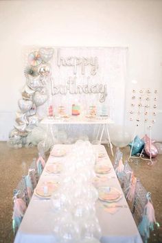 a table set up for a birthday party