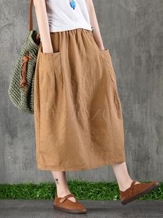 Sku CY-!32565 Material Linen Style Loose , Plus Size Occasion Going out , Casual , Vintage Seasons Spring , Summer , Autumn Type Skirts Bottoms Color ARMY GREEN,COFFEE,YELLOW,KHAKI,LINEN Size FREE SIZE Size chart: Please consult the size chart we provide for this item's measurements to help you decide which size to buy. Please note: There may be 1-3cm differ due to manual measurement. CMINCH Waist Hips Length FREE SIZE 64-84 116 75 Summer Skirt With Pockets, Cheap Cotton Skirt With Pockets, Casual Skirt With Side Pockets, Cheap Relaxed Skirt With Pockets, Cheap Casual Skirt With Side Pockets, Casual Brown Solid Color Skirt, Casual Beige Skirt With Pockets, Knee-length Beach Skirt With Pockets, Casual Beige Pencil Skirt