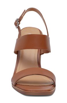 Light padding and slip resistance keep you comfortably grounded in this chic slingback sandal lifted on a hearty stacked heel. 4" heel Slip-resistant sole Leather upper/synthetic lining/rubber sole Imported Modern Brown High Heel Slingback Sandals, Modern Brown Slingback Sandals With Ankle Strap, Modern Brown Ankle Strap Slingback Sandals, Brown Slingback Heels With Cushioned Footbed, Brown Synthetic Heels With Heel Loop, Brown Open Toe Slingback Pumps With Removable Insole, Modern Synthetic Slingback Sandals With Stacked Heel, Brown Synthetic Slingback Pumps With Round Toe, Chic Brown Synthetic Slingback Sandals