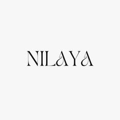 the word nilaya written in black on a white background