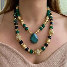 ✨ Discover the allure of our Black Agate and Jade Natural Stone Necklace, a piece where nature meets luxury. Specially designed with gold plating details, this necklace is a true embodiment of elegance and uniqueness. 🌿 🌟 The deep, mysterious hues of black agate harmonize beautifully with the soothing green tones of jade, creating a stunning visual contrast. Enhanced with delicate gold plating, this necklace is perfect for those who appreciate the beauty of natural stones. 💫 👑 Each necklace is a testament to bespoke craftsmanship and style. Whether it's for a special occasion or to add a touch of sophistication to your everyday wear, this necklace is sure to make a statement. 🎁 📦 Ready to be cherished by someone special or to become a treasured addition to your own jewelry collection Aluminum Wire Jewelry, Beaded Jewelry Necklaces, Pearl Necklace Vintage, Natural Stone Necklace, African Necklace, Hippie Necklace, Pearl Jewelry Necklace, Natural Stones Necklace, Stone Beaded Necklace