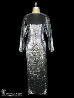 "BIG NEWS After 22 years, our website, TheFROCK.com, has had a makeover. Check out the new site, and join our mailing list for new arrivals.  Dazzling vintage Louis Feraud gown in the most incredible super soft silvery gray textile with a nearly furry pile. Lined. Rear asking slit. Rear invisible zipper. Measures about 34\" at bust, 30\" at waist, hips 37\", length 55.5\", and sleeve length 23.5\". Condition is excellent.  Layaway is available. ALL DELIVERY DATES mentioned by Etsy are ESTIMATES, Gown Long Sleeve, Louis Feraud, Dress Silver, Vintage Fur, Halloween Sale, Big News, New Years Sales, Mailing List, Silver Dress