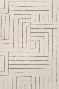 a white rug with black lines on it