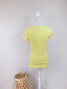 "Vintage 90s Neon Green Henley Clear Button Down V Neck Stretch Minimal Short Sleeve Top Blouse Tee Shirt Sz Medium This top is used but in good condition. Has no odors, tears. staining or repairs. Kept in smoke free environment. Brand: old navy This top measures: Bust: 34\" Waist: 30\" Hips: 36\" Top to bottom: 26\" (Measurements are taken across item laying flat and are then doubled.) Thanks for looking! Domestic Shipping: First Class (2-5 days) International Shipping: First Class (based on we Neck Stretches, Spring Sale, Star Shirt, Short Sleeve Top, Neon Green, Summer Sale, Floral Skirt, Vintage 90s, Short Sleeves Tops