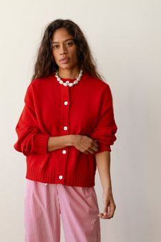 The Cotton Knit Cardigan Red Cardigan Work Outfit, Knit Button-up Sweater With Ribbed Cuffs, Classic Oversized Ribbed Cardigan, Winter Daywear Sweater With Buttons, Winter Sweater With Buttons For Daywear, Oversized Classic Knit Cardigan, Classic Oversized Knit Cardigan, Knit Cardigan With Buttons For Daywear, Relaxed Fit Knit Cardigan With Buttons