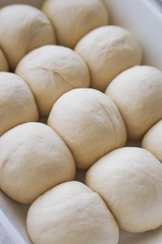 the doughnuts are ready to be made into buns in the baking dish