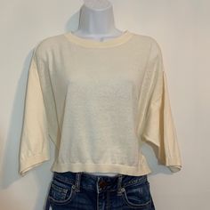 Ivory Knit Short Top By Gap Is Nwt Has Oversized Look . Size Medium 25” Across The Bust. 18” Long. White Casual Cropped Sweater For Layering, Beige Textured Knit Cropped Sweater With Crew Neck, Beige Textured Knit Crew Neck Cropped Sweater, Chic Cream Crew Neck Knit Top, Oversized White Fine Knit Tops, Gap Cropped Tops For Spring, White Knit Top For Spring Layering, Beige Soft Knit Crew Neck Top, Cream Fine Knit Crew Neck Top