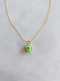 Green Evil Eye Charm Necklace | Etsy Adjustable Round Gold Charm Necklaces, Adjustable 14k Gold Filled Charm Necklaces, Adjustable Round Charm Necklace In 14k Gold Filled, Adjustable Round 14k Gold Filled Charm Necklace, Green Charm Necklace With Adjustable Round Pendant, Green Charm Necklace With Round Pendant And Adjustable Chain, Everyday Green Round Pendant Charm Necklaces, Trendy Snake Chain Charm Necklace For Gifts, Everyday Green Round Pendant Charm Necklace